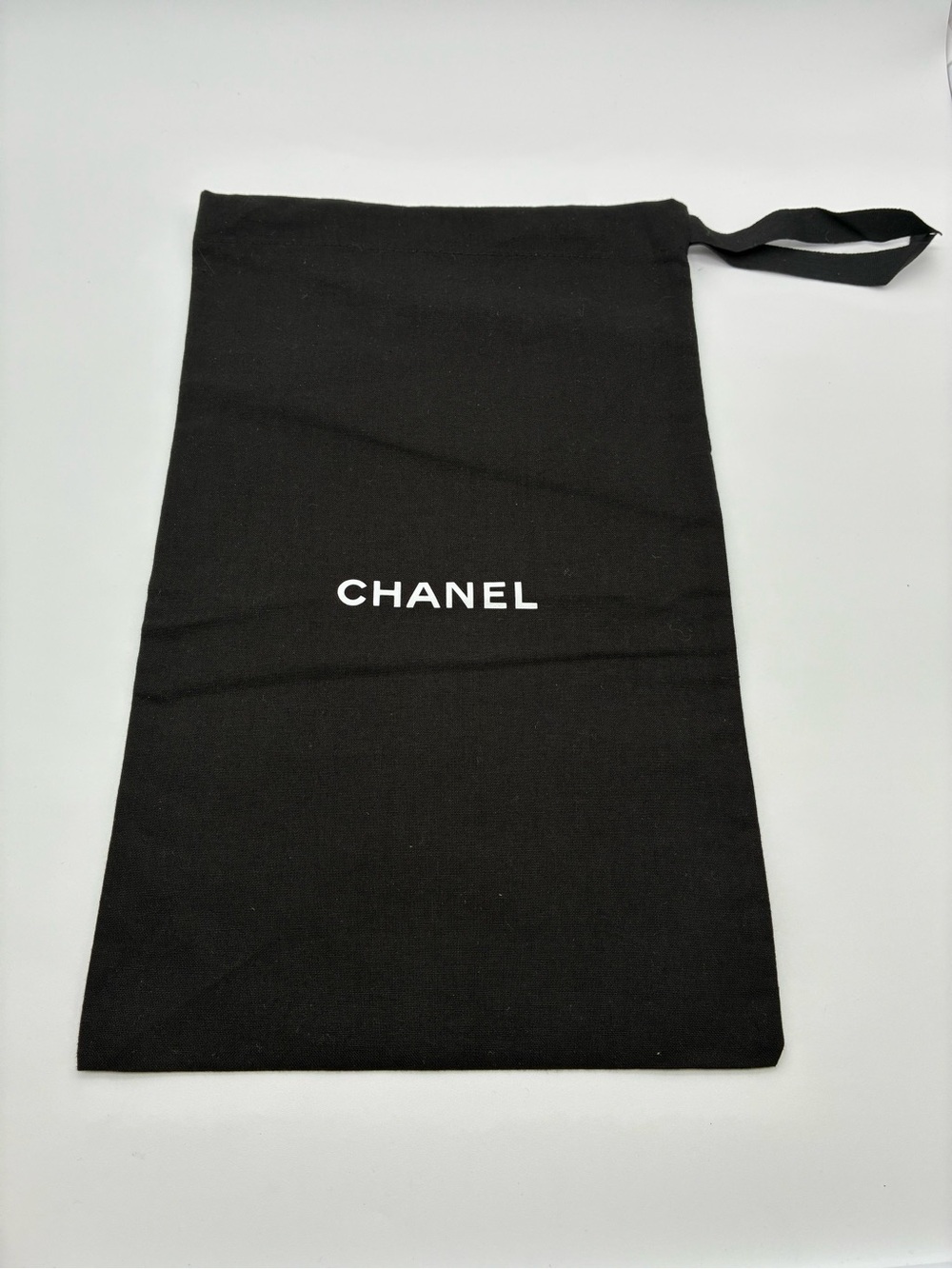CHANEL Black and White Logo Drawstring dust bag